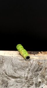This image portrays Galaxy(Green)Maple Burl Midsection(Stem) Dynavap by Dovetail Woodwork.