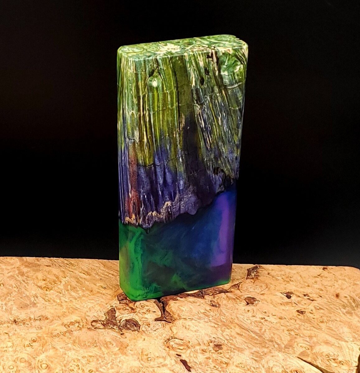 This image portrays Luminescent Dynavap Case - Elm Burl/Resin Hybrid by Dovetail Woodwork.