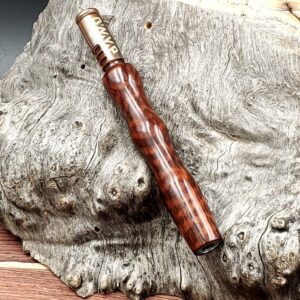 This image portrays Dynavap XL Midsection - Snakewood by Dovetail Woodwork.