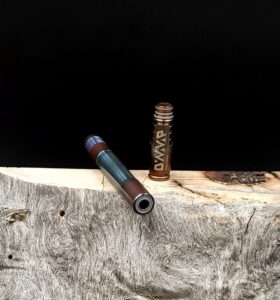 This image portrays Stainless Steel Dynavap XL Midsection - Color Tempered by Dovetail Woodwork.