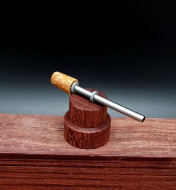 This image portrays Dynavap Spinning Mouthpiece- Golden Amboyna Burl by Dovetail Woodwork.
