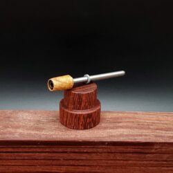This image portrays Dynavap Spinning Mouthpiece- Golden Amboyna Burl by Dovetail Woodwork.
