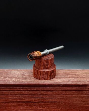 This image portrays Dynavap Spinning Mouthpiece-Bacote Wood by Dovetail Woodwork.