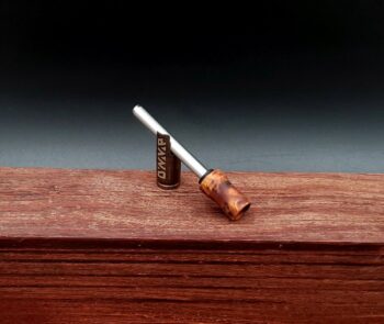 This image portrays Dynavap Spinning Mouthpiece-Thuya Burl by Dovetail Woodwork.