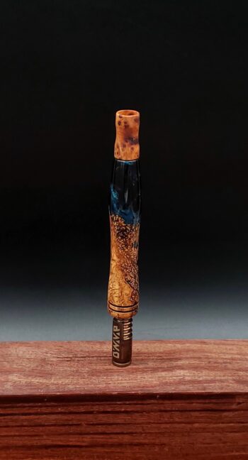 This image portrays Dynavap Spinning Mouthpiece-Thuya Burl by Dovetail Woodwork.