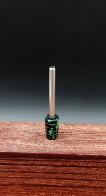 This image portrays Dynavap Spinning Mouthpiece-Resin Spiral Twist by Dovetail Woodwork.