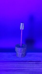 This image portrays Dynavap Spinning Mouthpiece-Curupau Wood-UV/Black Light Reactive! by Dovetail Woodwork.
