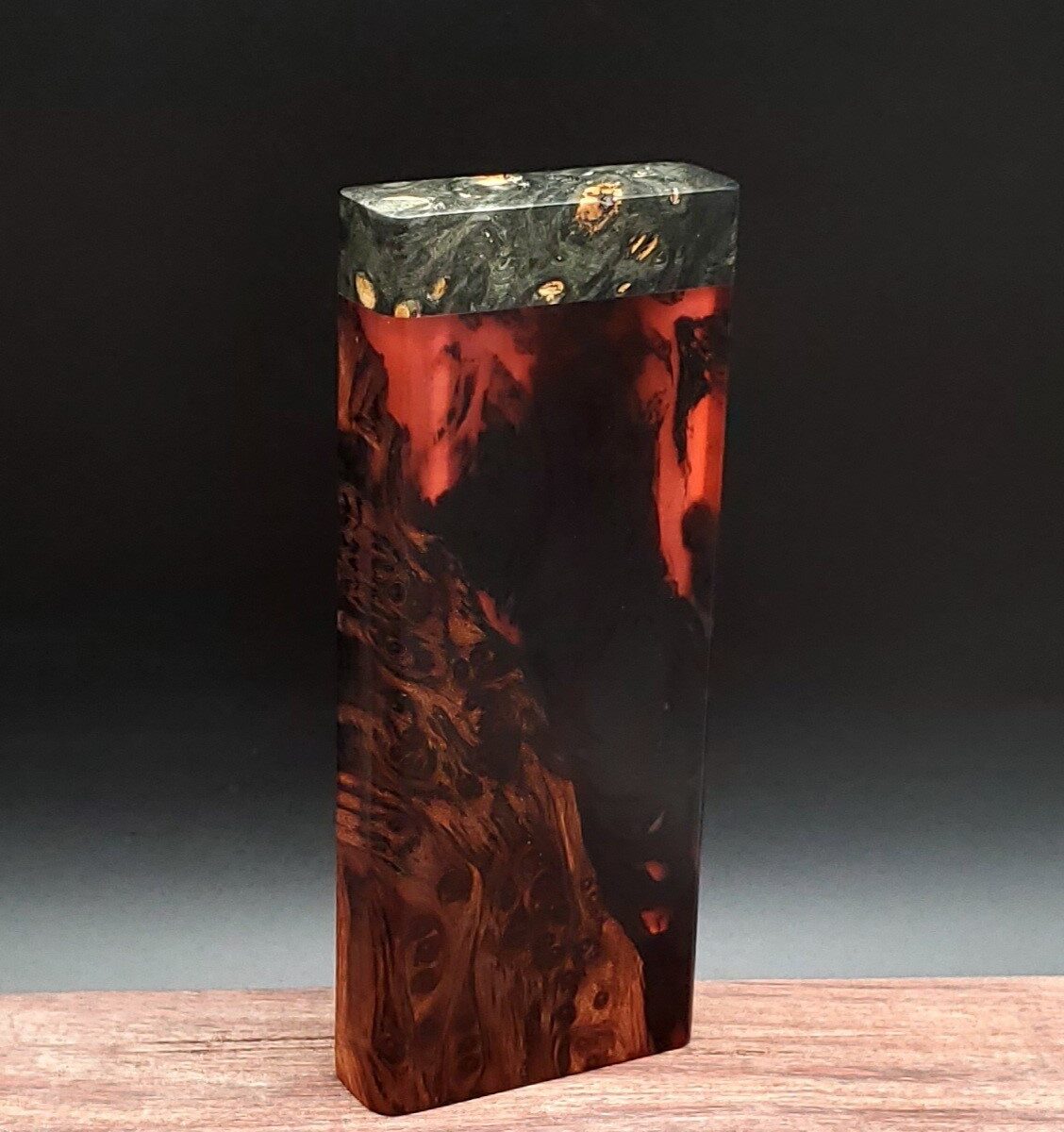 This image portrays Luminescent Hybrid Burl Dynavap Stash Case by Dovetail Woodwork.