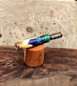This image portrays Dynavap Midsection/Stem - Cosmic Burl Hybrid by Dovetail Woodwork.