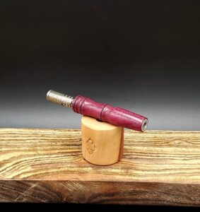 This image portrays Purpleheart Wood Dynavap Stem Upgrade by Dovetail Woodwork.