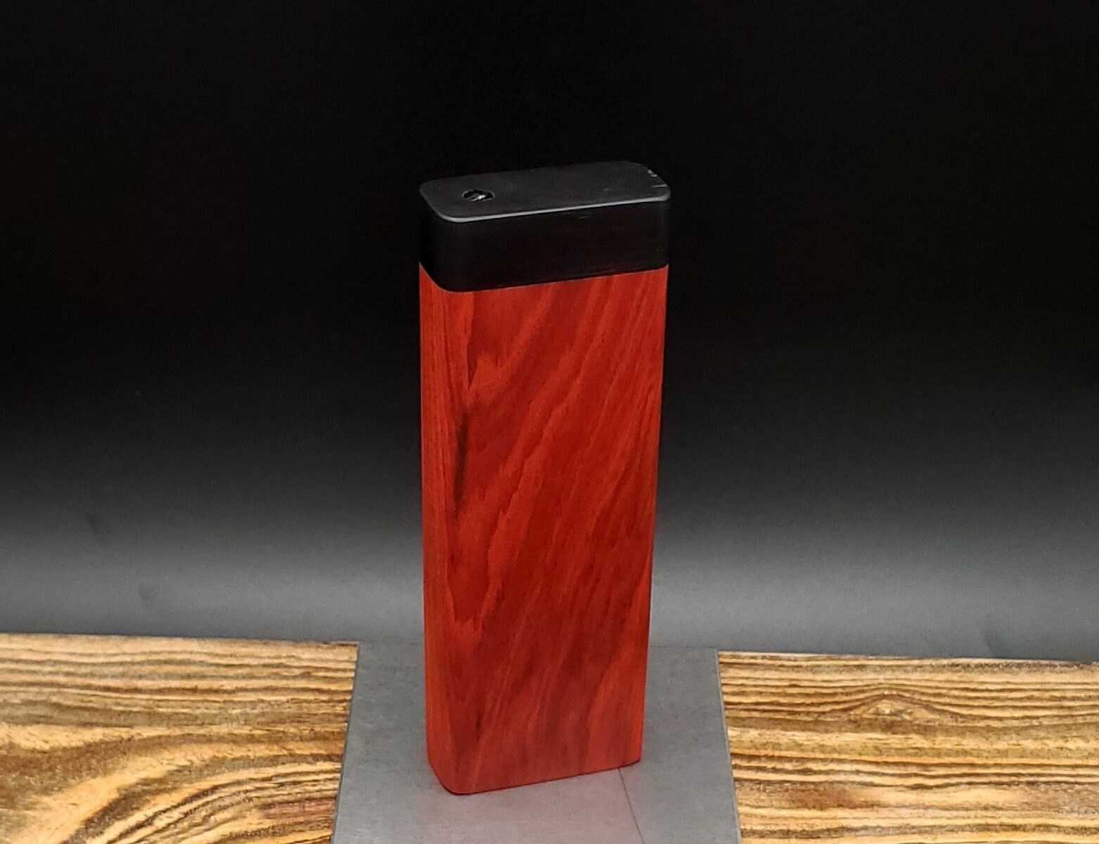 This image portrays Dynavap Quick Stash-Redheart/Ebony wood by Dovetail Woodwork.