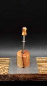 This image portrays Dynavap Spinning Mouthpiece-Olive Wood by Dovetail Woodwork.