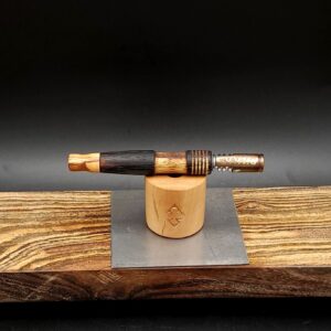 This image portrays Dynavap Spinning Mouthpiece-Olive Wood by Dovetail Woodwork.