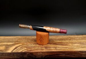 This image portrays Dynavap Spinning Mouthpiece-Purpleheart Wood by Dovetail Woodwork.