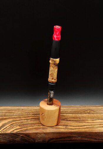 This image portrays Dynavap Spinning Mouthpiece-Cosmic Pink by Dovetail Woodwork.