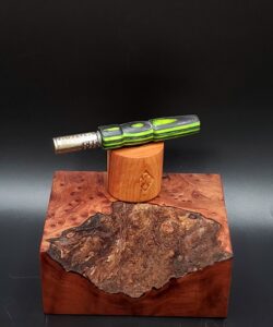This image portrays Green/Black-Dovetail Woodwork Themed-Dynavap Stem Upgrade by Dovetail Woodwork.
