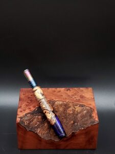 This image portrays Cosmic Burl XL Hybrid-Dynavap Stem/Midsection by Dovetail Woodwork.