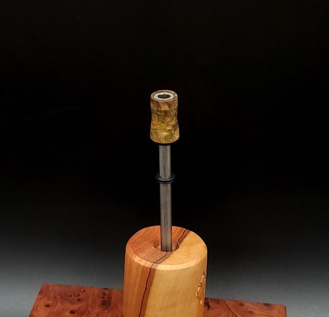 This image portrays Dynavap Spinning Mouthpiece-Cosmic Burl Series by Dovetail Woodwork.