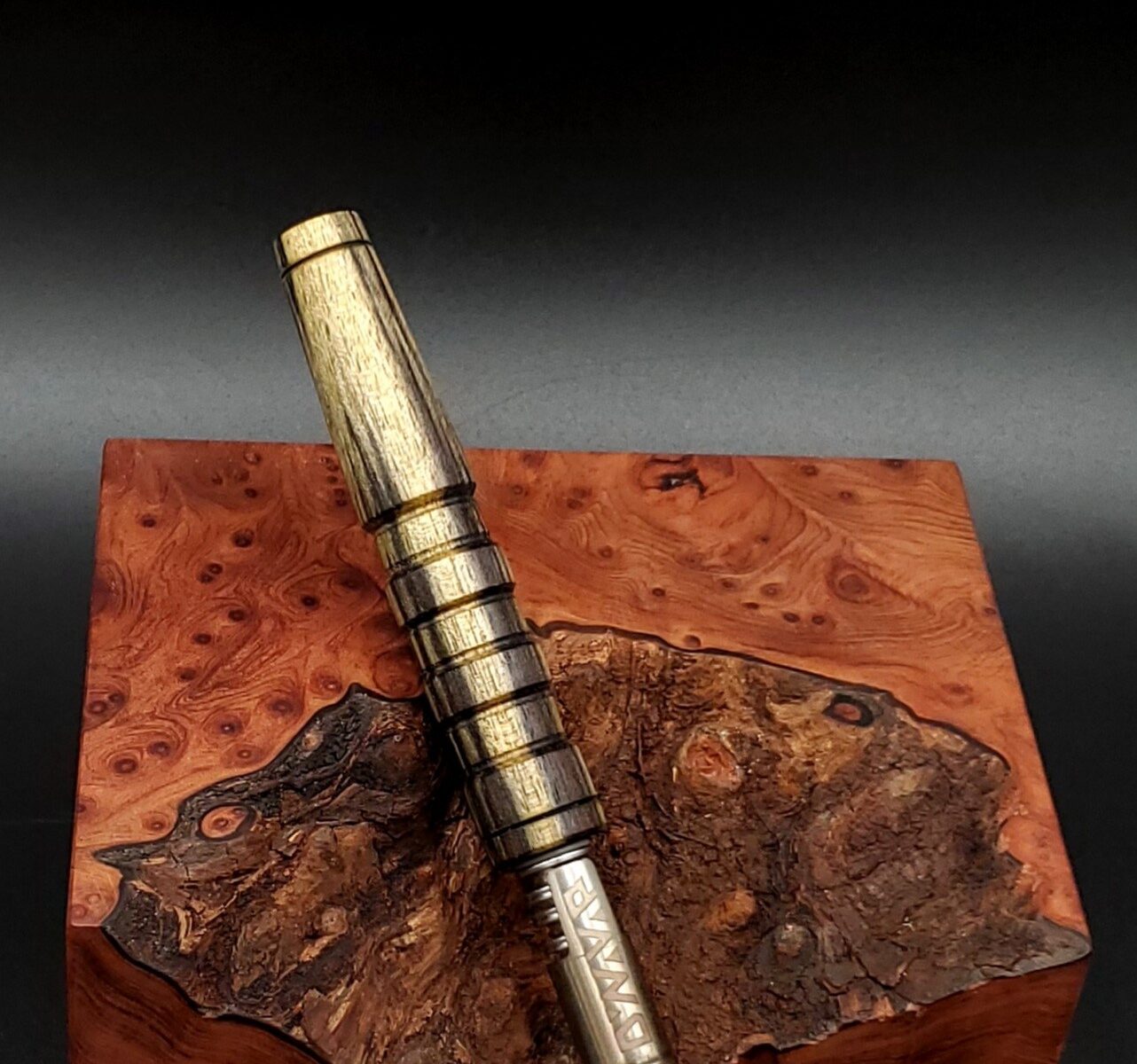 This image portrays Blue Mahoe Wood-XL Dynavap Stem Upgrade by Dovetail Woodwork.