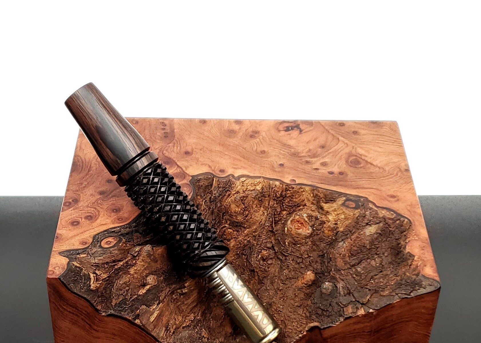 This image portrays Twisted Stem Series-Blackwood Dynavap Stem/Midsection by Dovetail Woodwork.