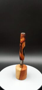 This image portrays Rare Cocobolo Burl XL Hybrid-Dynavap Stem/Midsection by Dovetail Woodwork.