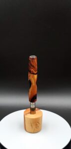 This image portrays Rare Cocobolo Burl XL Hybrid-Dynavap Stem/Midsection by Dovetail Woodwork.