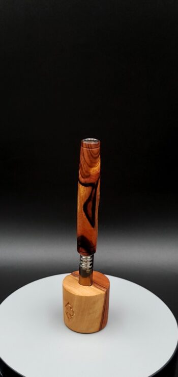 This image portrays Rare Cocobolo Burl XL Hybrid-Dynavap Stem/Midsection by Dovetail Woodwork.