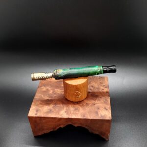 This image portrays Cosmic Burl Series-Dynavap Stem/Midsection by Dovetail Woodwork.