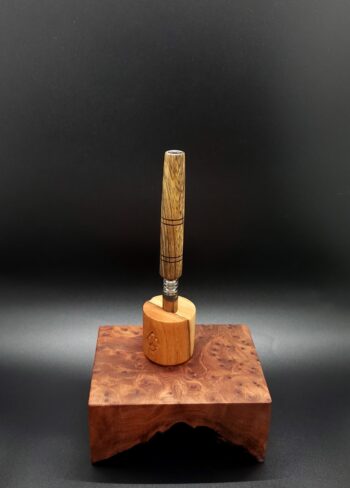 This image portrays Black Limba XL Dynavap Stem Upgrade by Dovetail Woodwork.