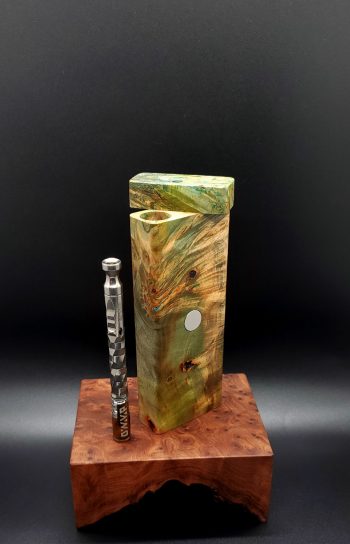 This image portrays Cosmic Burl XL Dynavap Stash Case by Dovetail Woodwork.