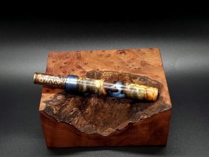 This image portrays Luminescent Galactic Burl XL Hybrid-Dynavap Stem by Dovetail Woodwork.