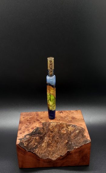 This image portrays Luminescent Cosmic Burl Series XL Hybrid-Dynavap Stem by Dovetail Woodwork.