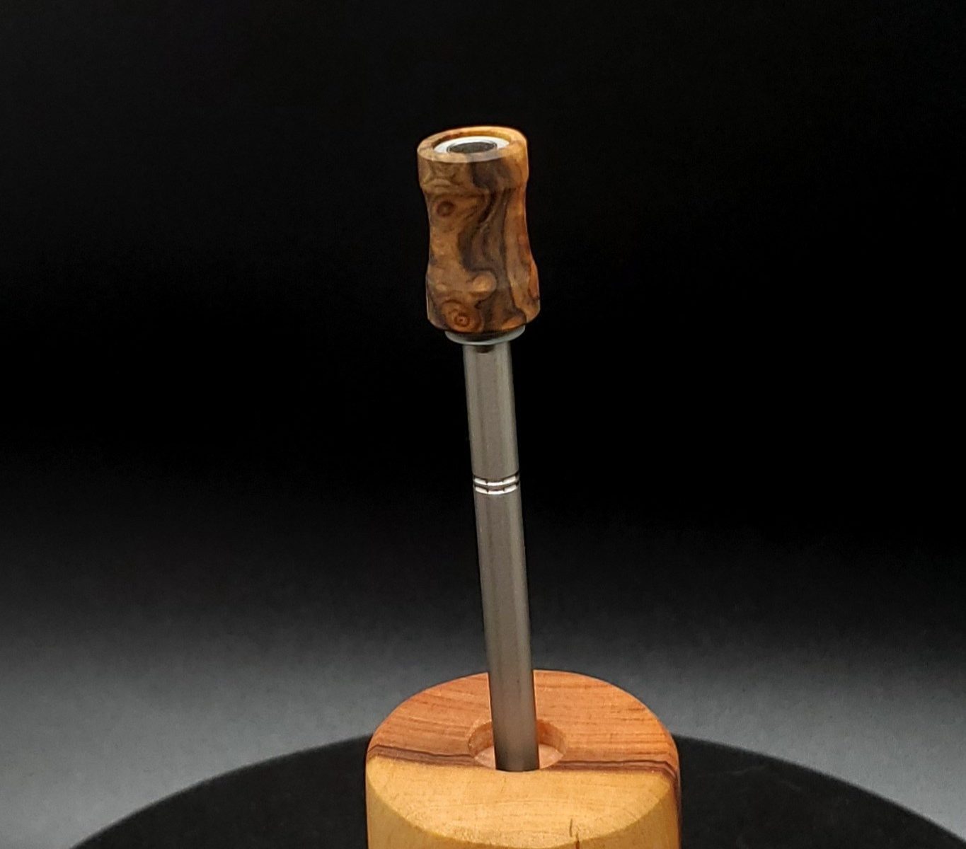 This image portrays Dynavap Spinning Mouthpiece-Graybox Burl by Dovetail Woodwork.