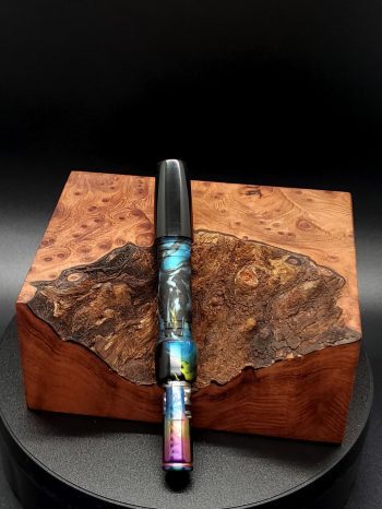 This image portrays Cosmic/Twisted Series XL-Dynavap Stem by Dovetail Woodwork.