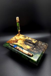 This image portrays Dynavap Stand & Sorting Tray/Stem Stand-Buckeye Burl Hybrid by Dovetail Woodwork.