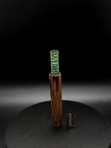 This image portrays Custom Anodized/Opalescent Green-Dynavap Titanium Tip-VONG(2021) by Dovetail Woodwork.