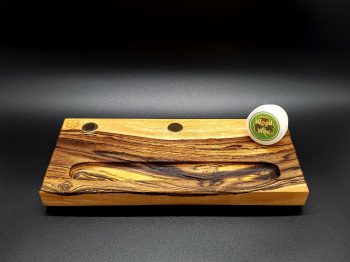 This image portrays Dynavap Stem Display-Rare Two Tone Bocote Wood by Dovetail Woodwork.