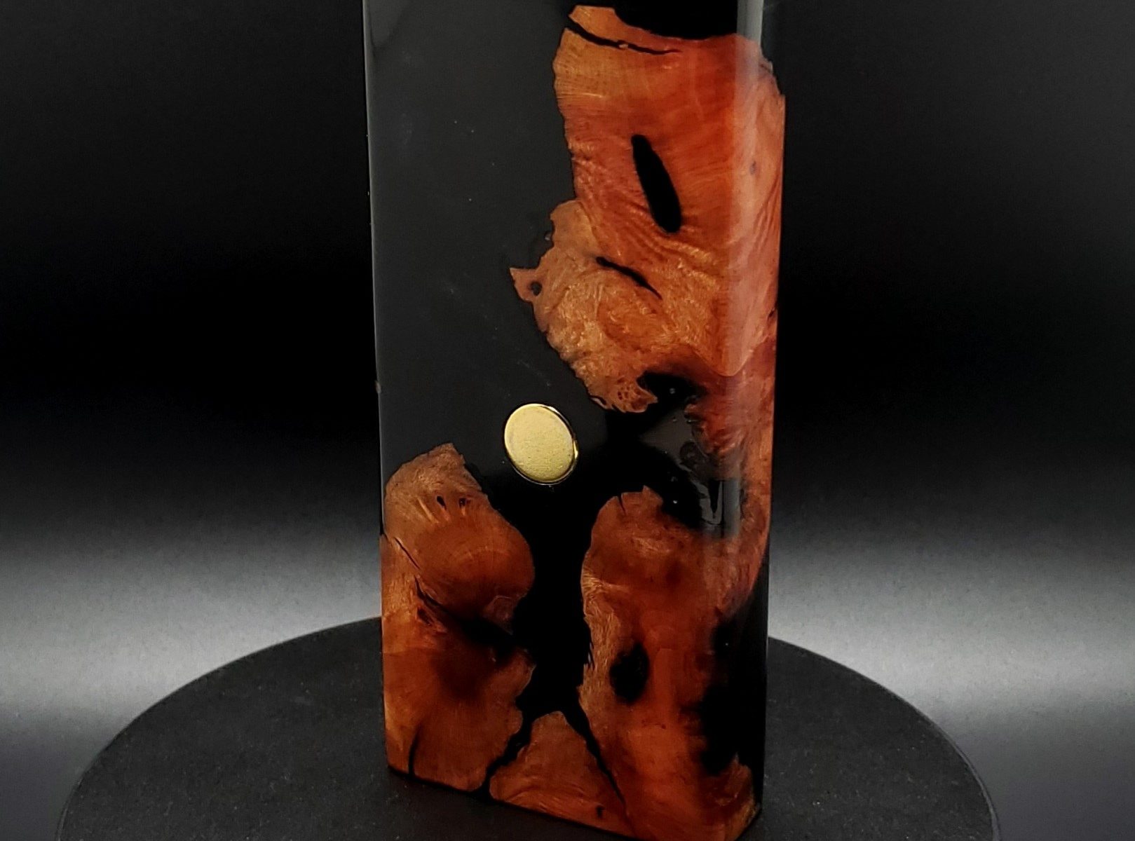 This image portrays 2G-XL Stash-Manzanita Burl/Slim Black Hybrid-Dynavap Case by Dovetail Woodwork.