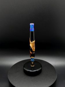 This image portrays Cosmic Series-Buckeye Burl Hybrid-XL Dynavap Stem by Dovetail Woodwork.