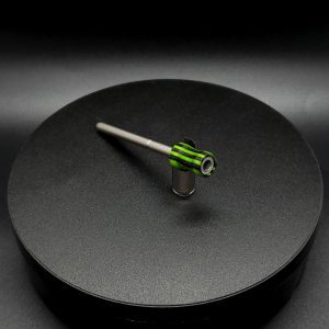 This image portrays Dynavap Spinning Mouthpiece-Dovetail Green/Black by Dovetail Woodwork.