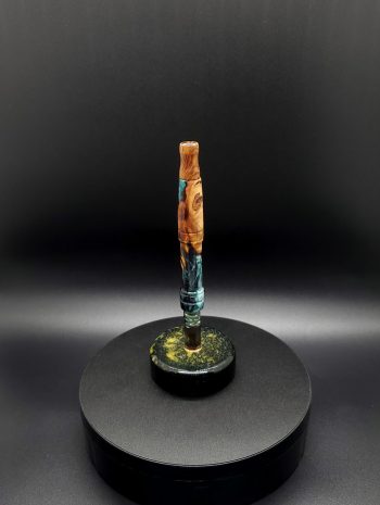 This image portrays Luminescent Cosmic Series-Buckeye Burl Hybrid-XL Dynavap Stem by Dovetail Woodwork.