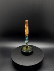 This image portrays Luminescent Cosmic Series-Buckeye Burl Hybrid-XL Dynavap Stem by Dovetail Woodwork.