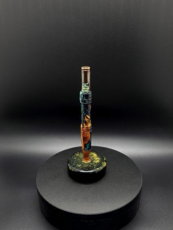 This image portrays Luminescent Cosmic Series-Buckeye Burl Hybrid-XL Dynavap Stem by Dovetail Woodwork.