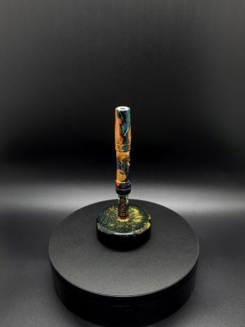 This image portrays Luminescent Cosmic Series-Buckeye Burl Hybrid-XL Dynavap Stem by Dovetail Woodwork.