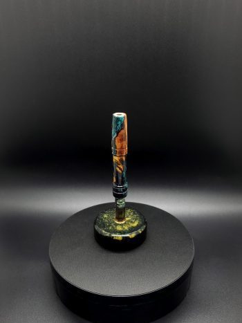 This image portrays Luminescent Cosmic Series-Buckeye Burl Hybrid-XL Dynavap Stem by Dovetail Woodwork.