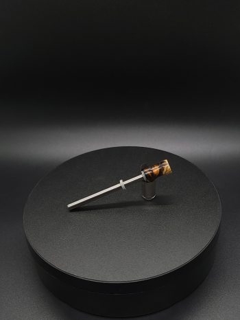 This image portrays Luminescent Hybrid Dynavap Spinning Mouthpiece by Dovetail Woodwork.