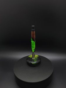 This image portrays Twisted Series-Cosmic Green Hybrid-XL Dynavap Stem by Dovetail Woodwork.