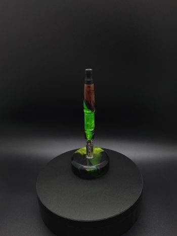 This image portrays Twisted Series-Cosmic Green Hybrid-XL Dynavap Stem by Dovetail Woodwork.