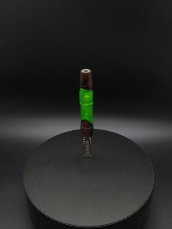 This image portrays Twisted Series-Cosmic Green Hybrid-XL Dynavap Stem by Dovetail Woodwork.