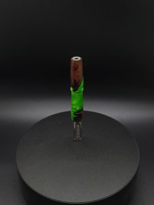 This image portrays Twisted Series-Cosmic Green Hybrid-XL Dynavap Stem by Dovetail Woodwork.